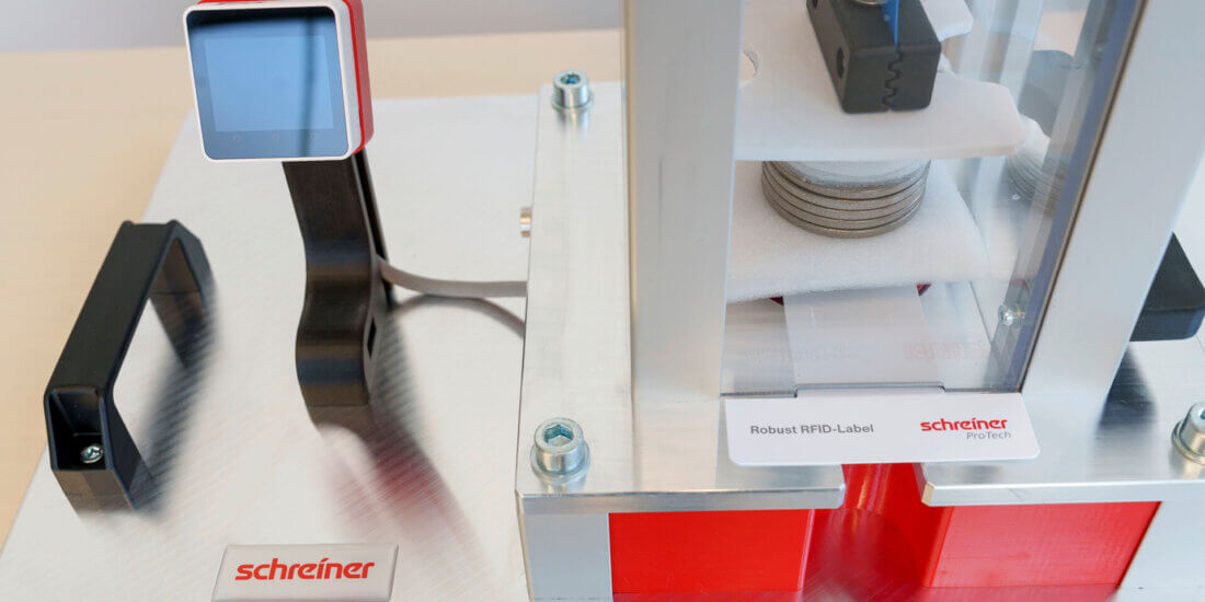 After the impact, a reader checks whether the RFID chip is still readable.
