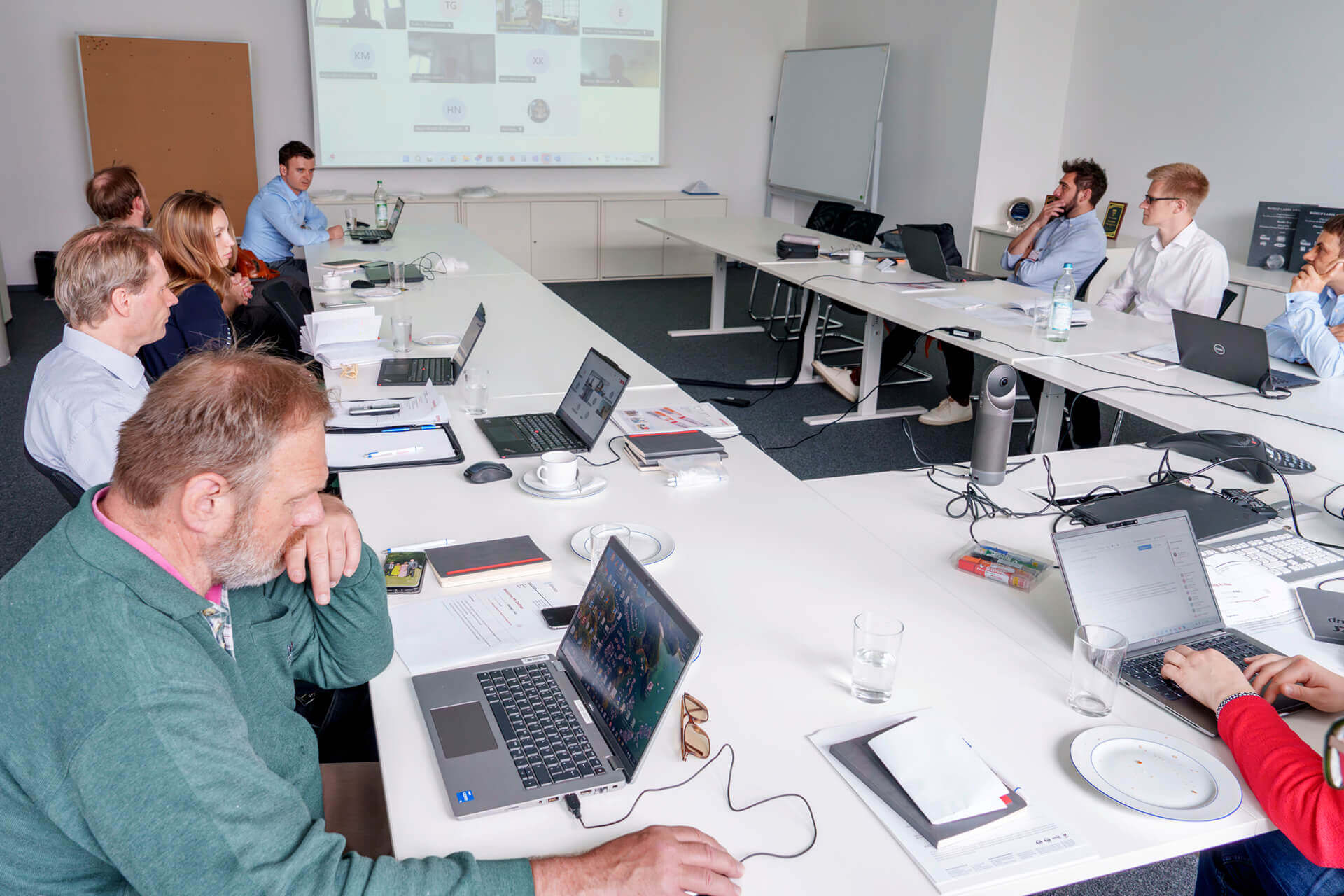 schreiner-group-connected-sustainability Participants are focused on following the presentation.