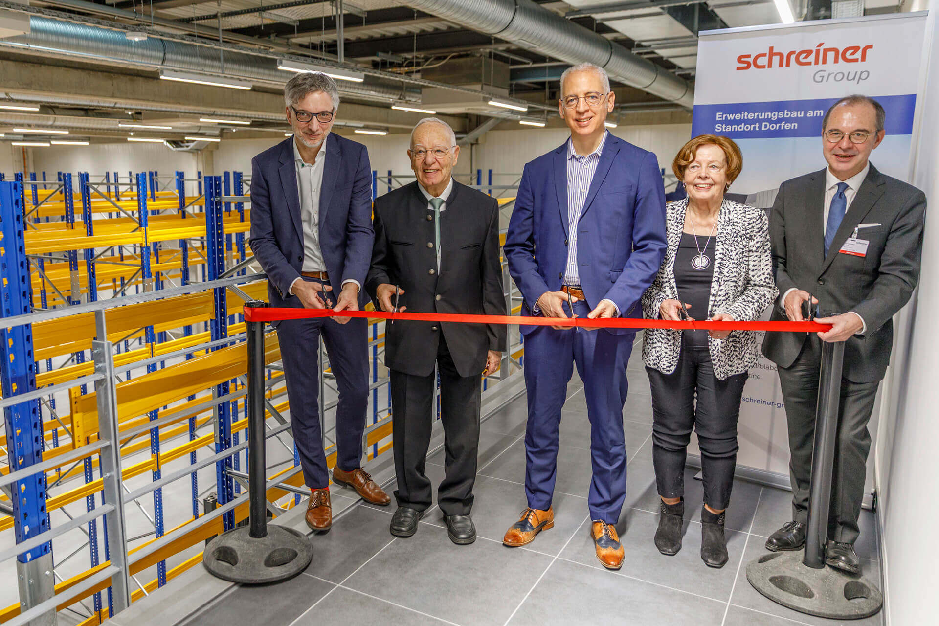 Operations Manager Martin Moser, Senior Shareholder and Investor Helmut Schreiner, CEO Roland Schreiner, his mother, Ulrike Schreiner, and Dorfen’s Mayor at the time, Heinz Grundner (from left to right) symbolically open the new building.
