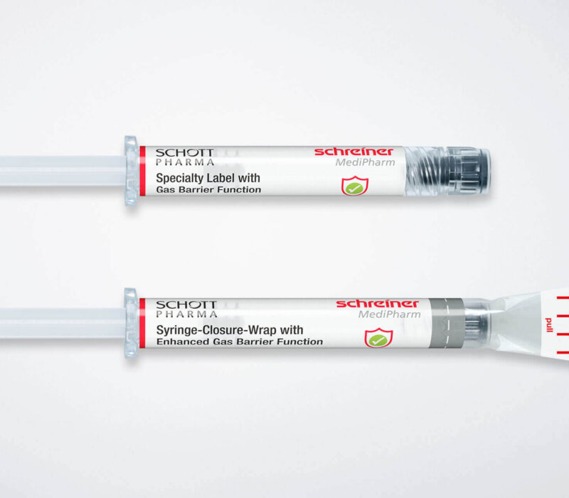Two barrier solutions for COC syringes: The Gas-Protect-Label protects the syringe body, while the Syringe-Closure-Wrap additionally encloses the syringe cap and further increases the gas barrier.